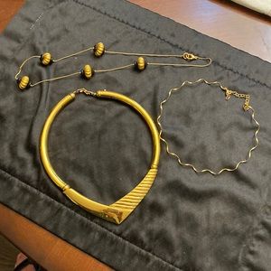Gold and black necklaces